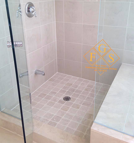 Shower after FGS Tile and Grout - Re- Grout Services that includes safely removing old grout and replacing it with new grout to waterproof and restore your shower, walls, and floors.