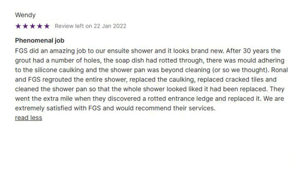 Screenshot of a 5-star review from Wendy, posted on January 22, 2022, praising FGS Tile and Grout for their phenomenal job on an ensuite shower renovation. Wendy explains that after 30 years, the grout had holes, the soap dish had rotted, and there was mould and damaged caulking. The shower pan seemed beyond cleaning, but Ronal and the FGS team regrouted, replaced caulking, replaced cracked tiles, cleaned the shower pan, and even replaced a rotted entrance ledge. Wendy says the shower now looks brand new and highly recommends FGS. Below the review is the FGS Tile and Grout logo, contact details (647-710-5076), website (fgstileandgrout.ca), and service areas Toronto–GTA and Durham Region.